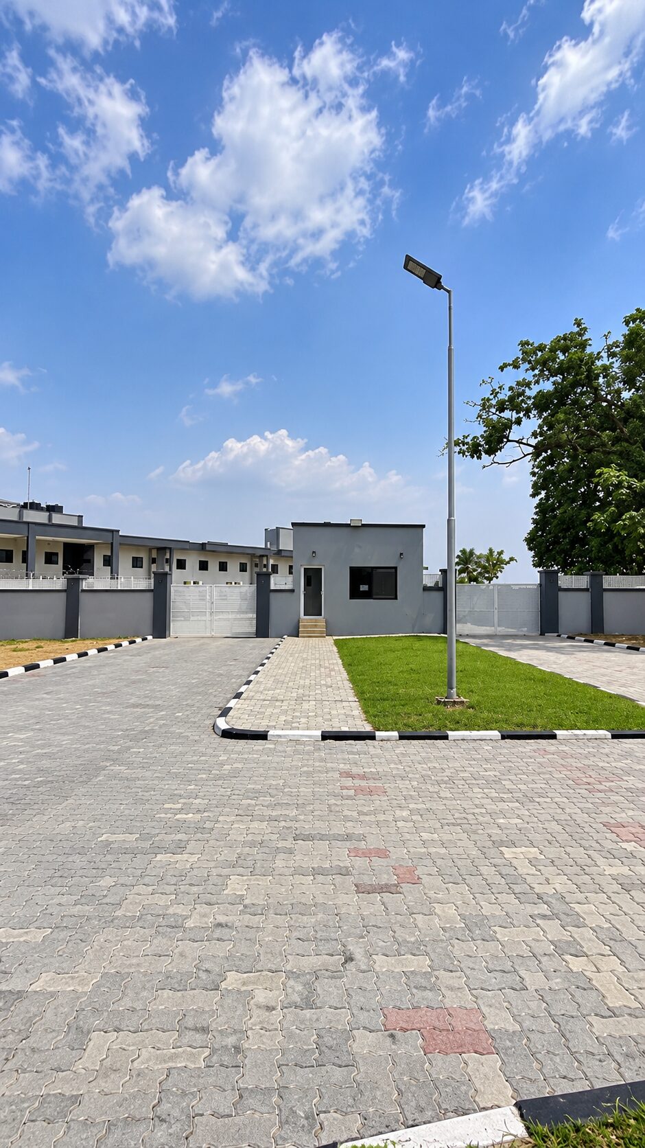 The Hostel Guru entrance gate and compound in Jabi, Abuja